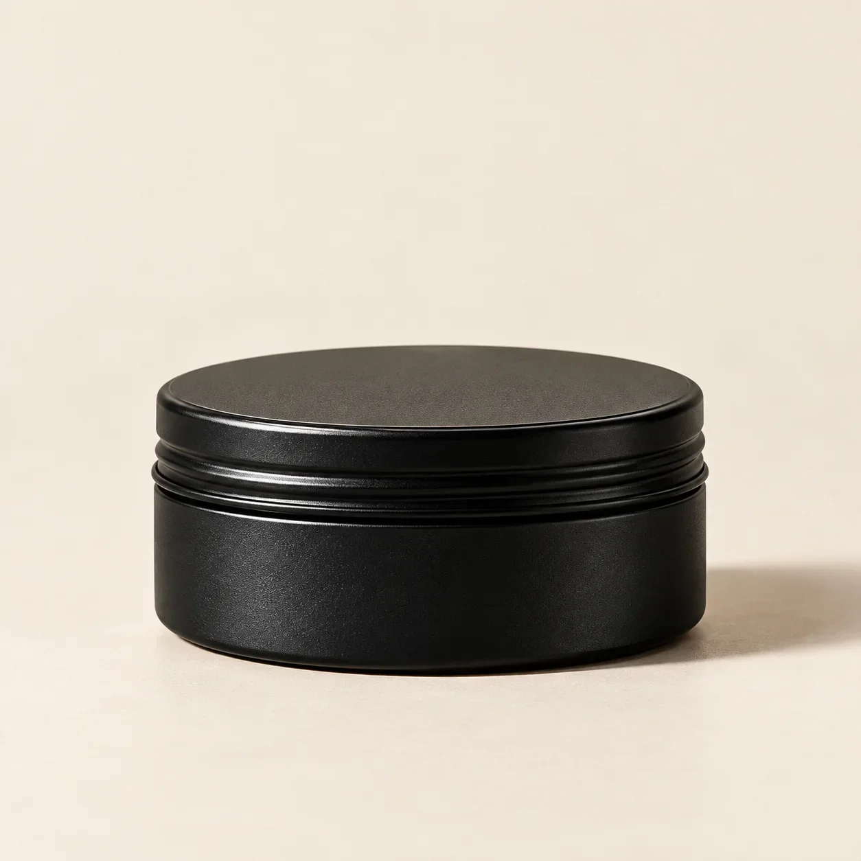 Matte black styling clay tin